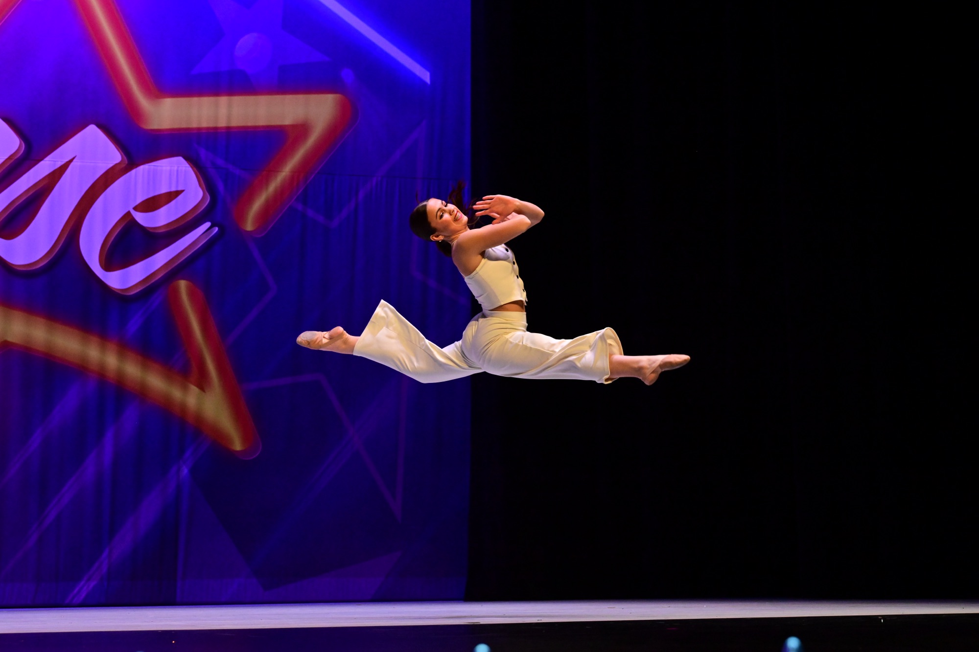 USDC dancer performing on stage