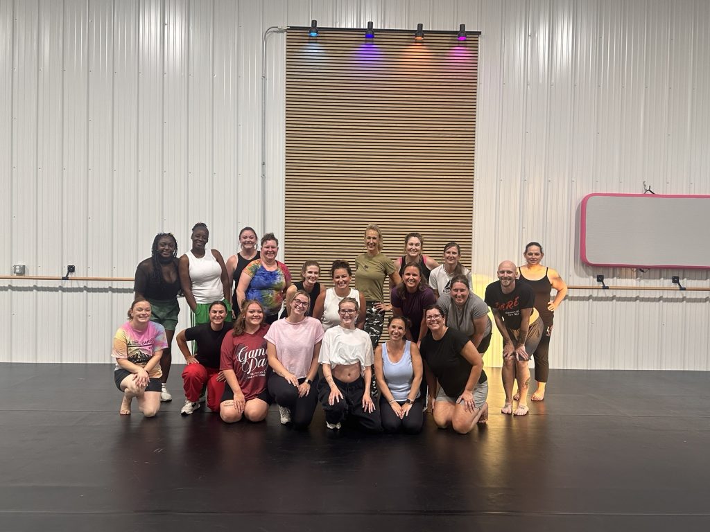 Dancers and instructors together inside the USDC studio